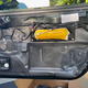 The yellow sausage is the side impact airbag. That’s explodey and is why you disconnect the battery before digging into the door.